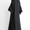 Black or apricot lantern sleeve single-breasted long dress made of chiffon with a solid color, round neck, puff long sleeves, and loose waist, available in one size.