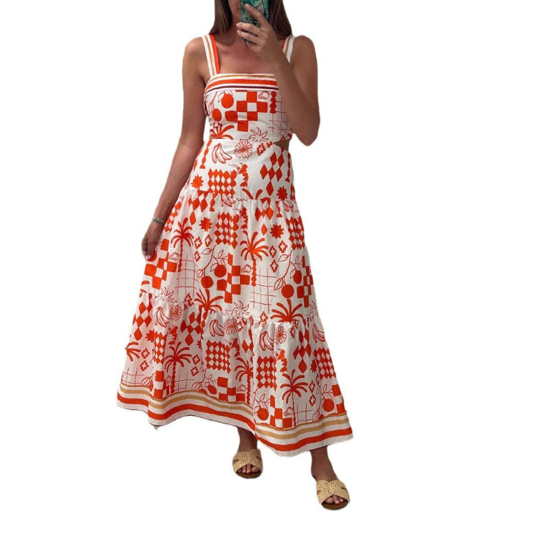 A model wearing a floral print colorblock strapless long dress with a one-shoulder design.
