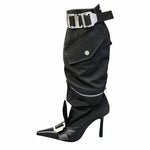 Step out boldly with these pointed toe, knee-length boots featuring a long tube design and a striking belt buckle detail.