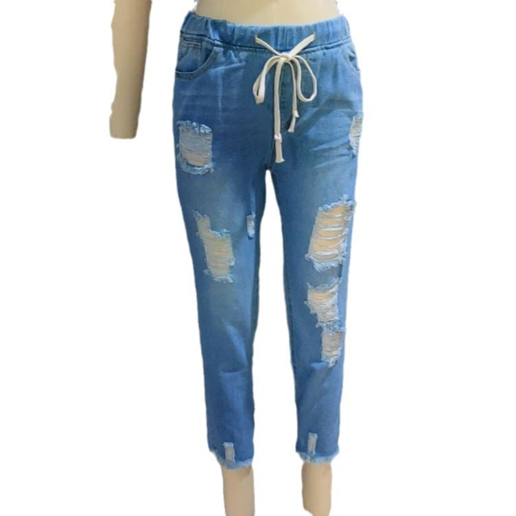 The New Standard: Stretch Skinny Ripped Washed Denim Mom Jeans