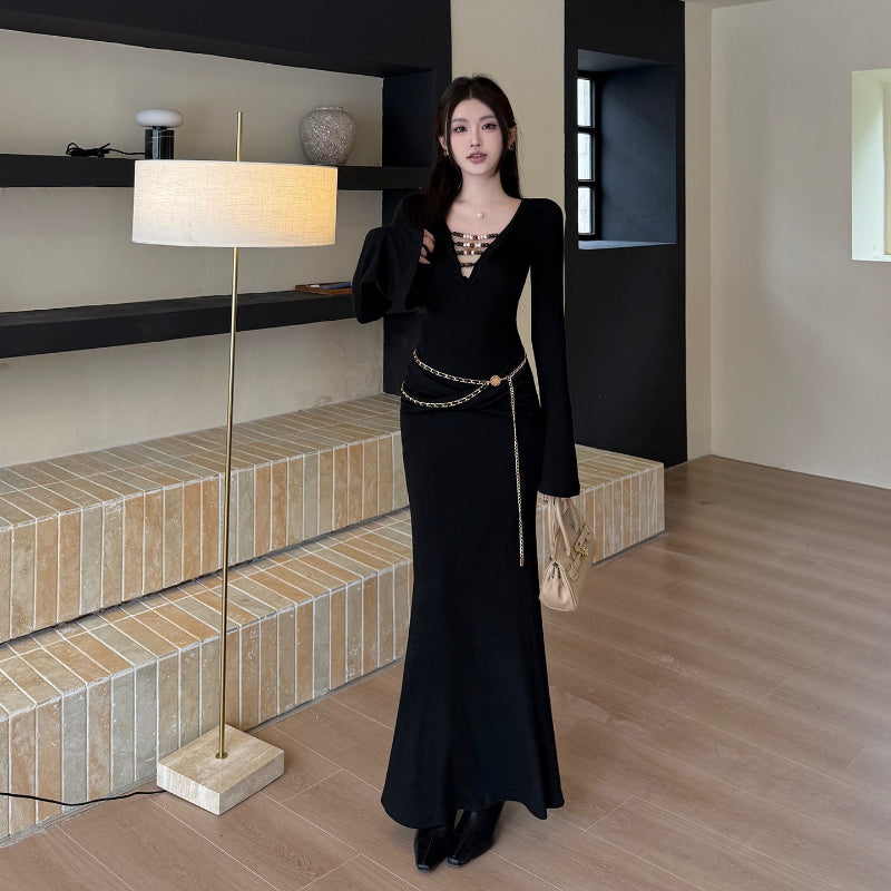 The Black V-Neck Midi: Beading, Boldness & Glamour