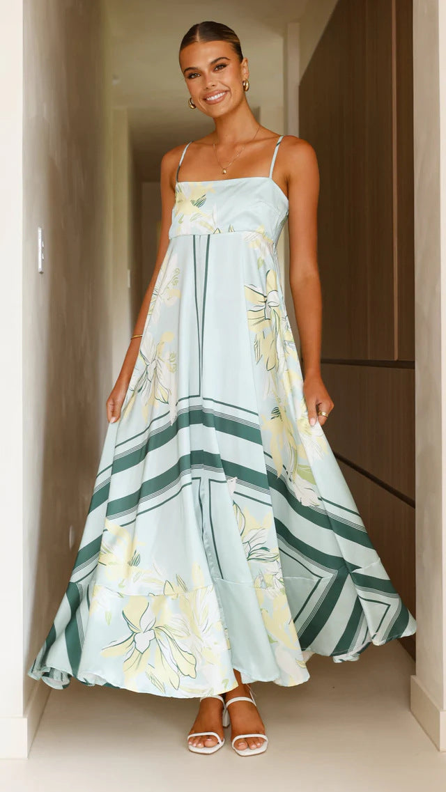 A collection of large swing suspender midi dresses in various prints and colors, including purple stripes, brown stripes, red floral, and different floral patterns.