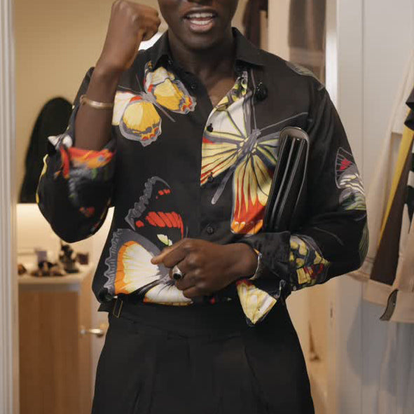Chic Black Button-Up Shirt With Vibrant Butterfly Motif