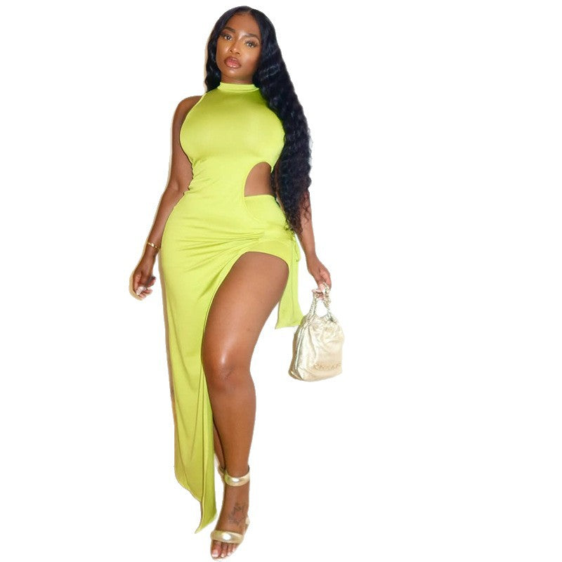 A sleeveless, high-neck midi dress with an irregular hem and side slit, shown in a vibrant yellow-green color.