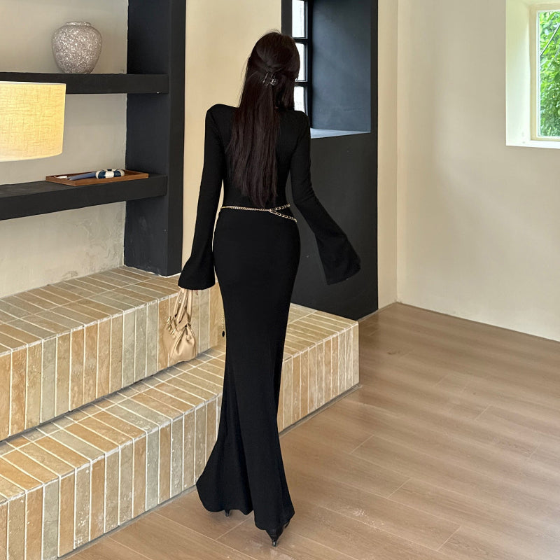 The Black V-Neck Midi: Beading, Boldness & Glamour