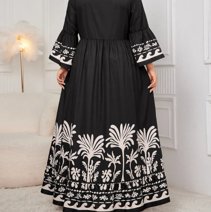 Honey Plus Size Printed V-Neck Long Sleeve Maxi Dress. Elegant V-neck, all-over print, long sleeves, comfortable stretch fabric.