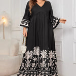 Honey Plus Size Printed V-Neck Long Sleeve Maxi Dress. Elegant V-neck, all-over print, long sleeves, comfortable stretch fabric.