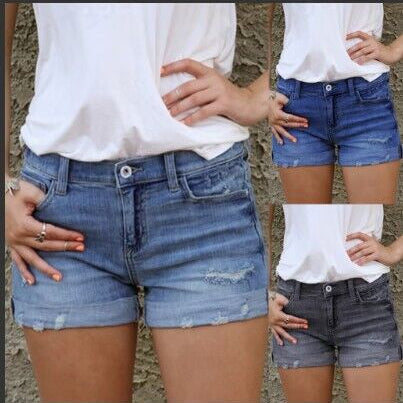 Edgy Summer Style: Ripped Denim Shorts for a Daring Look