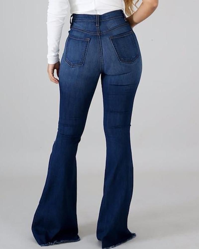 High Waist Ripped Flared Jeans - runwayfashionista.com