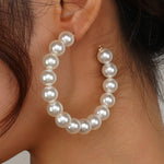 The Power Piece: Commanding Attention with Large Circle Pearl Earrings