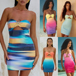 A sleeveless sequin-printed mini dress in vibrant pink, yellow, orange, green, and multicolor.