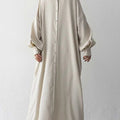 Black or apricot lantern sleeve single-breasted long dress made of chiffon with a solid color, round neck, puff long sleeves, and loose waist, available in one size.