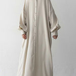 Black or apricot lantern sleeve single-breasted long dress made of chiffon with a solid color, round neck, puff long sleeves, and loose waist, available in one size.
