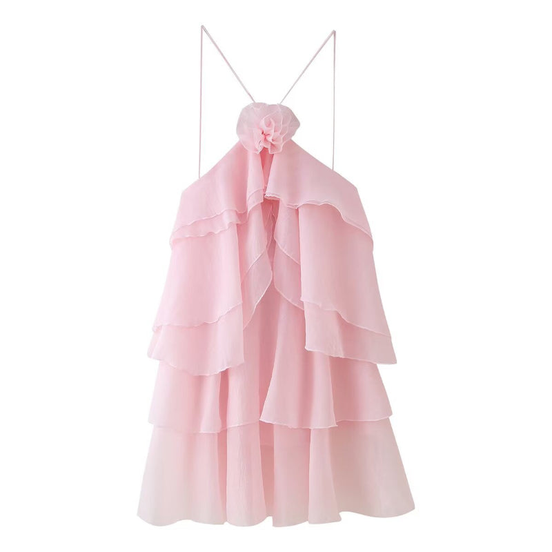 A sleeveless, strapless short dress with layered ruffles, a V-neck, and a mid-waist fit.