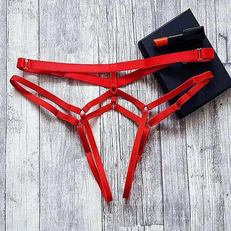 Red or black plus size lace-up thong made of woven polyester, offering no trace, hip lift, and breathability, available in sizes S-3XL.