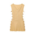 An elegant, sleeveless linen dress in a solid color with a stylish waist cut-out and a round neck.