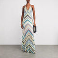 A sleeveless multicolor floral bodycon midi dress with pullover closure from Runwayfashionista.
