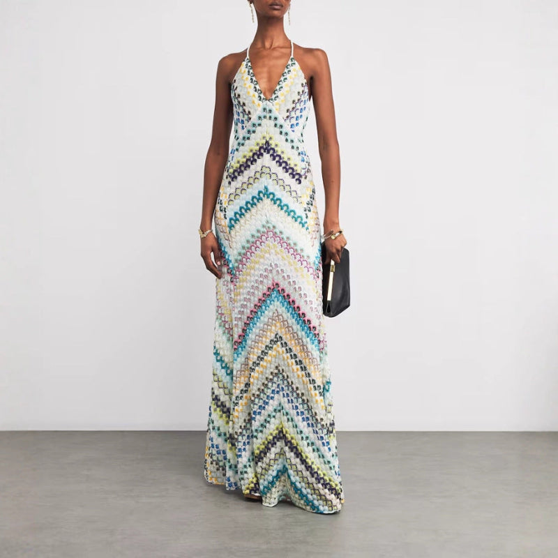 A sleeveless multicolor floral bodycon midi dress with pullover closure from Runwayfashionista.