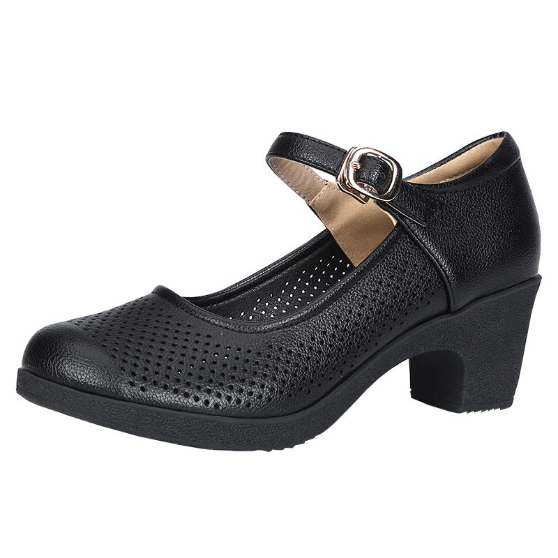 A pair of hollow sandals with a buckle closure, round toe, and low heel, showcasing the casual style and comfortable design.
