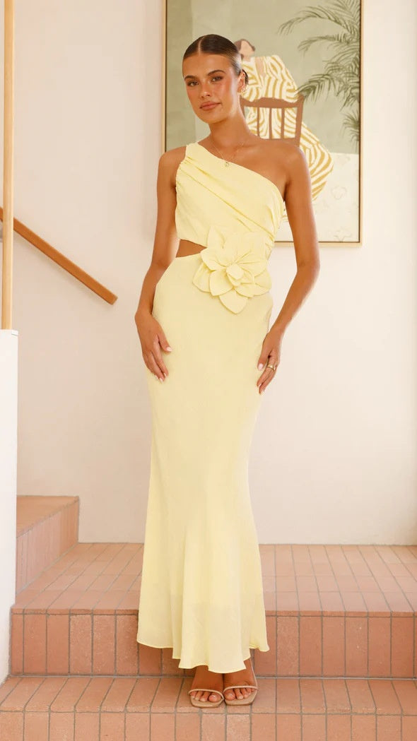 A fitted strapless midi dress in a solid color (red, yellow, or blue), designed for office wear, with a high waist.