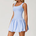 A two-piece sports dress set in a solid color, designed for comfort and flexibility during various athletic activities.