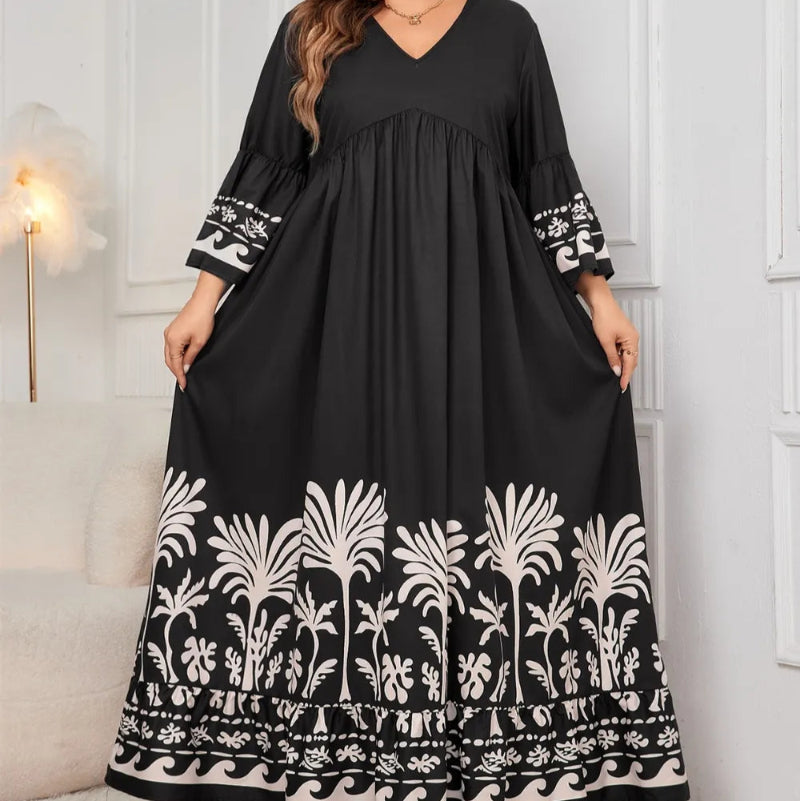 Honey Plus Size Printed V-Neck Long Sleeve Maxi Dress. Elegant V-neck, all-over print, long sleeves, comfortable stretch fabric.