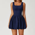 A two-piece sports dress set in a solid color, designed for comfort and flexibility during various athletic activities.