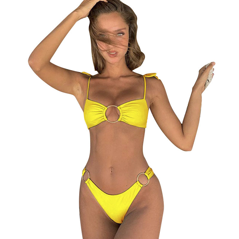 A model wears a stylish Round Ring Tie Bikini in a vibrant color, showcasing the design's comfortable fit and adjustable ties.