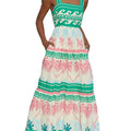 A green, sleeveless, one-shoulder bandage midi dress with bow tie suspenders, shown on a mannequin from the front.