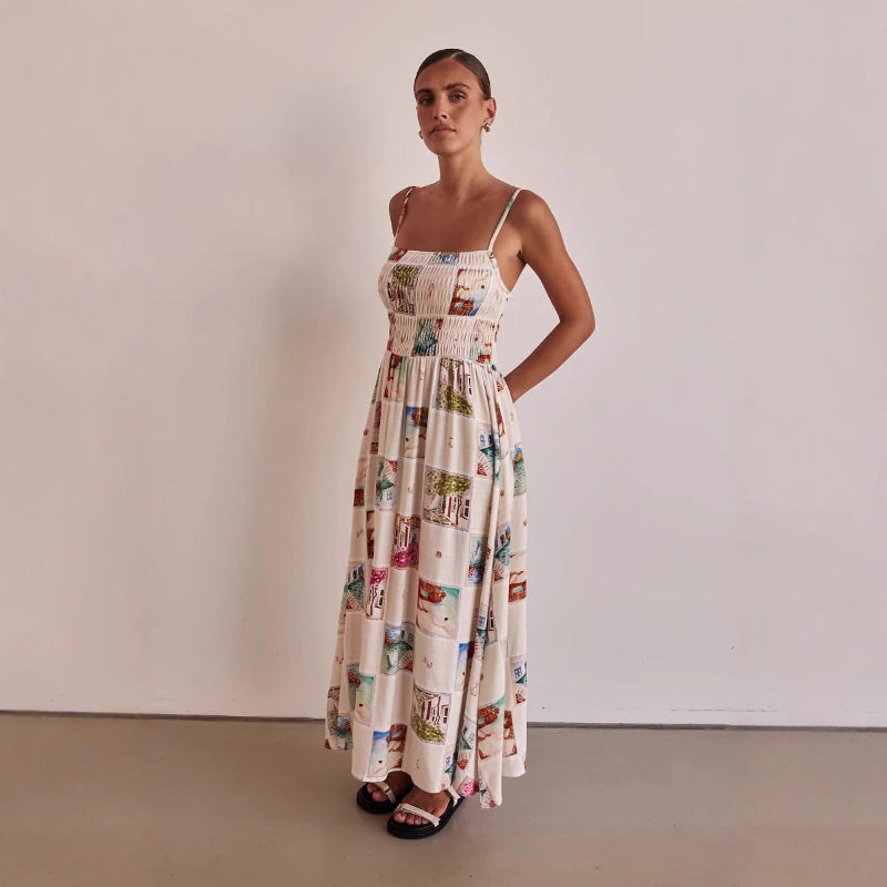 A model wearing a floral print, one-shoulder, sleeveless, A-line midi dress with a high waist, suitable for business or elegant events.
