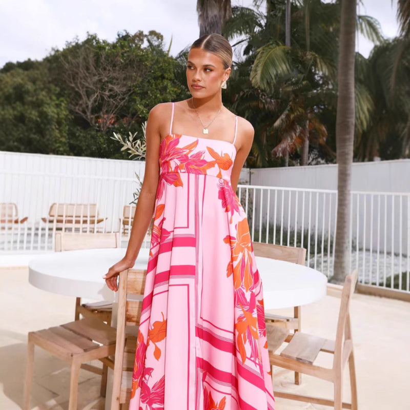 A collection of large swing suspender midi dresses in various prints and colors, including purple stripes, brown stripes, red floral, and different floral patterns.