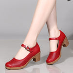 A pair of hollow sandals with a buckle closure, round toe, and low heel, showcasing the casual style and comfortable design.