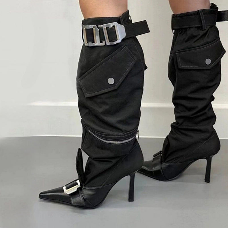 Step out boldly with these pointed toe, knee-length boots featuring a long tube design and a striking belt buckle detail.