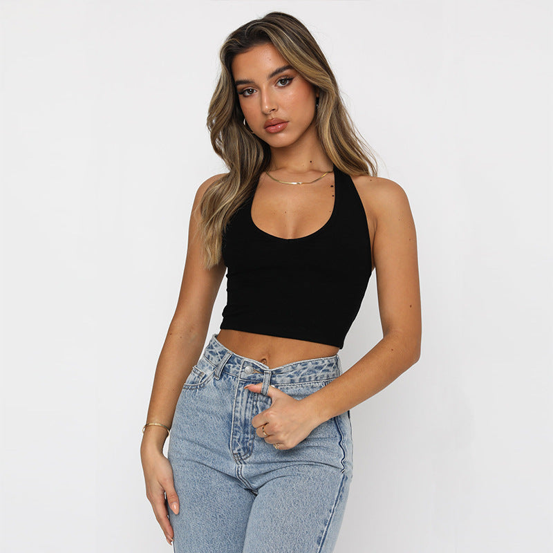 A white slim-fit sleeveless halter top displayed on a mannequin, showcasing its solid color and street fashion style.
