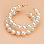 The Power Piece: Commanding Attention with Large Circle Pearl Earrings