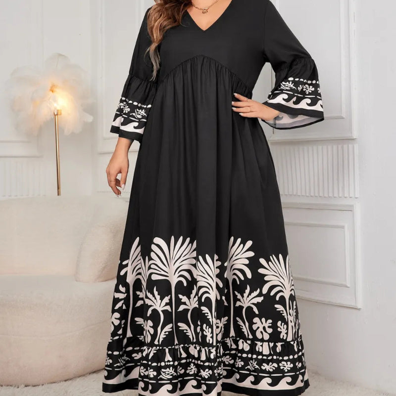 Honey Plus Size Printed V-Neck Long Sleeve Maxi Dress. Elegant V-neck, all-over print, long sleeves, comfortable stretch fabric.