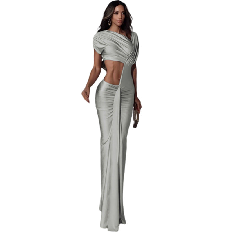 High-waisted silver long dress with irregular hollow pattern and short sleeves.