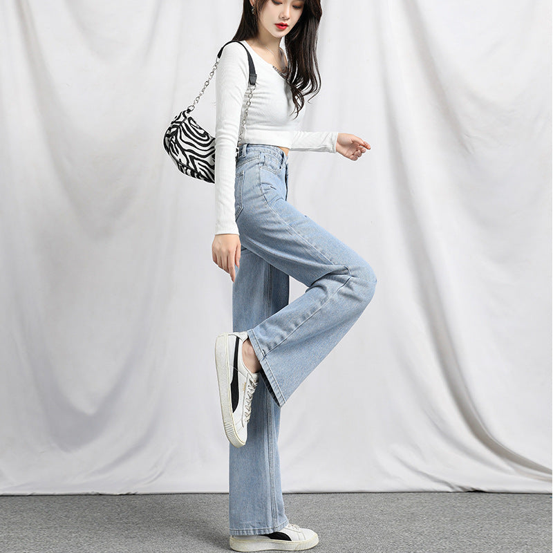 Irregular High Waist Slimming Jeans - runwayfashionista.com