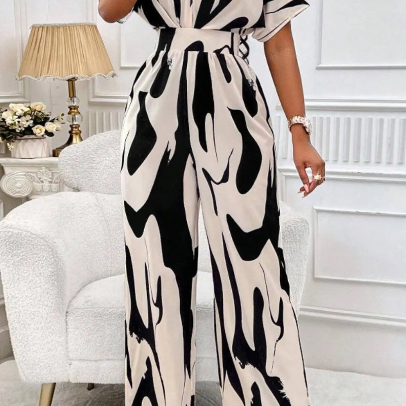 Elegant V-neck batwing sleeve wide jumpsuit - runwayfashionista.com