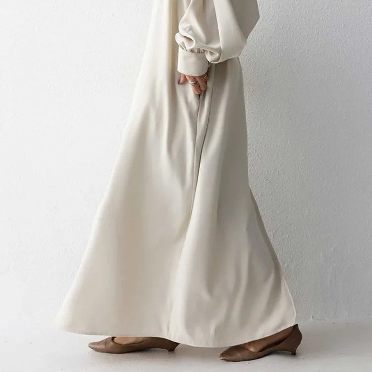 Black or apricot lantern sleeve single-breasted long dress made of chiffon with a solid color, round neck, puff long sleeves, and loose waist, available in one size.