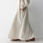 Black or apricot lantern sleeve single-breasted long dress made of chiffon with a solid color, round neck, puff long sleeves, and loose waist, available in one size.