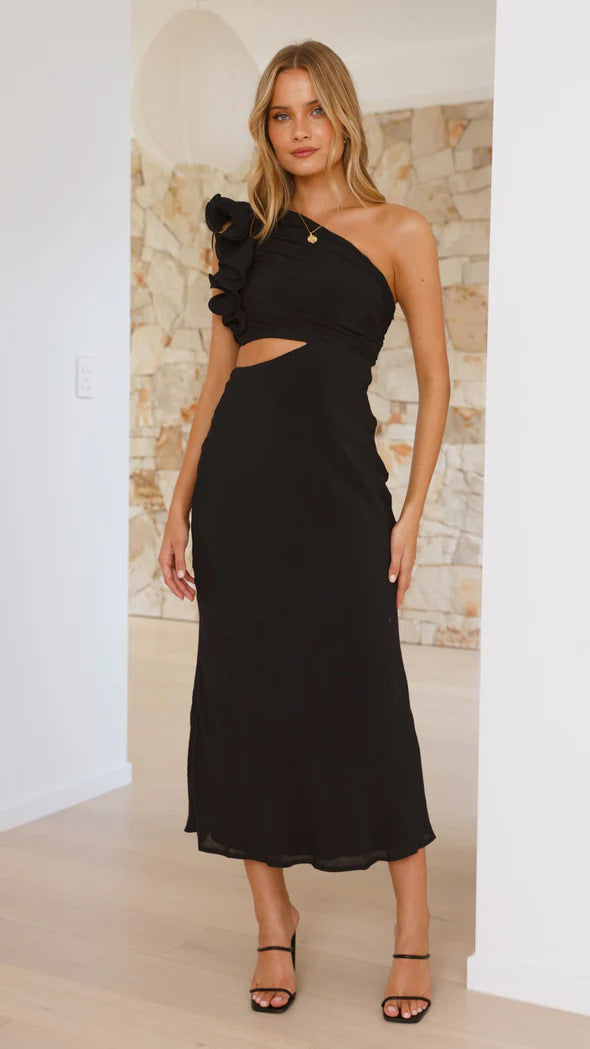A fitted, one-shoulder maxi dress with a V-neck and sleeveless design, available in green, yellow, rose pink, red, and black, suitable for resort wear.
