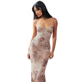 Text: A strapless, bodycon midi dress with a floral print, shown in a purple color.


