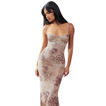 Text: A strapless, bodycon midi dress with a floral print, shown in a purple color.