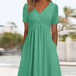 Gemini saidEffortless Chic: The V-Neck Short Sleeve Pocket Midi Dress - green