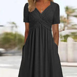 Gemini saidEffortless Chic: The V-Neck Short Sleeve Pocket Midi Dress - back