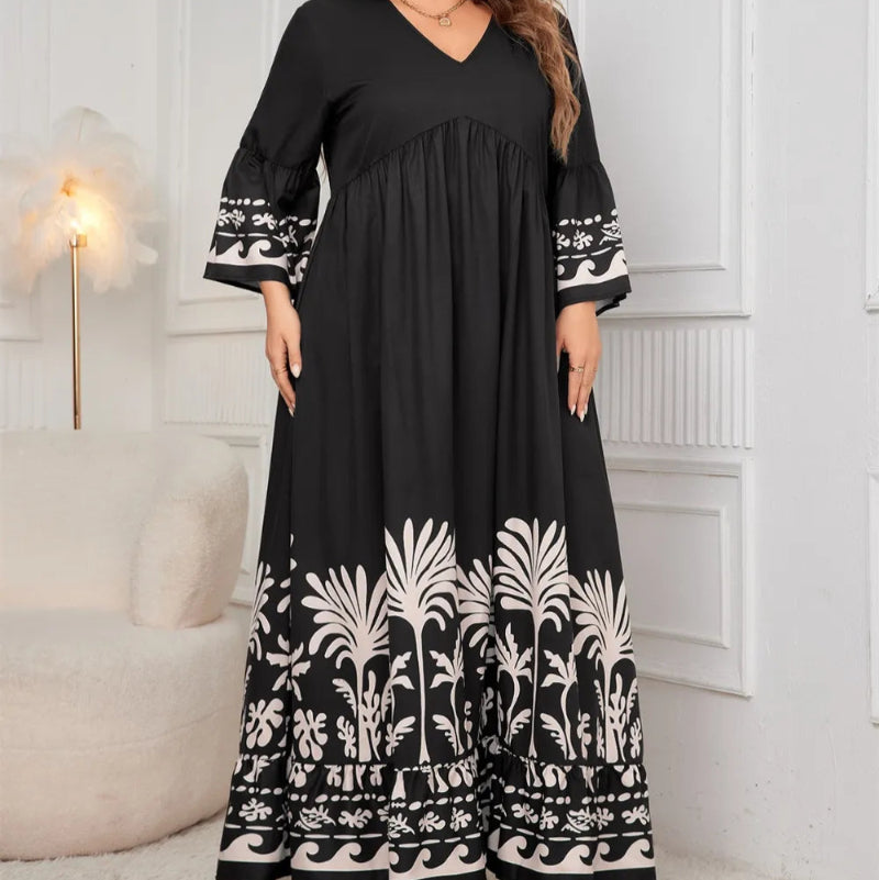 Honey Plus Size Printed V-Neck Long Sleeve Maxi Dress. Elegant V-neck, all-over print, long sleeves, comfortable stretch fabric.