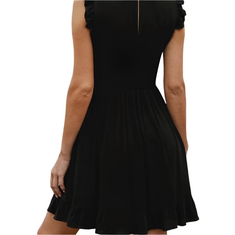 Ruffled sleeveless mini dress - runwayfashionista.com