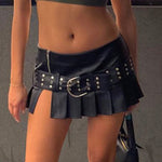 Embrace bold fashion with this punk-inspired leather mini skirt featuring a flattering A-line cut for an edgy look.