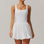 A two-piece sports dress set in a solid color, designed for comfort and flexibility during various athletic activities.